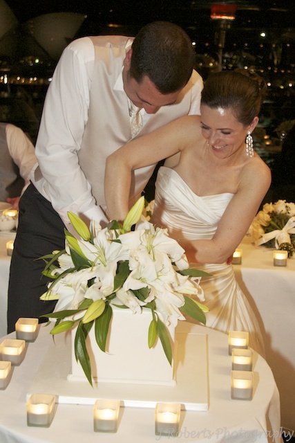 Bride & Groom cutting cake - wedding photography